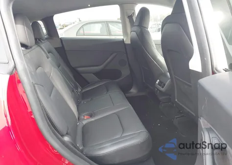 2023 Tesla Model Y Awd/Long Range Dual Motor All-Wheel Drive z USA, uszkodzony, nr VIN 7SAYGDEE9PA115198